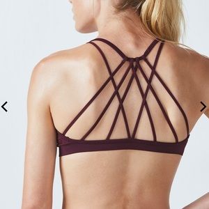 Maroon/burgundy Fabletics strappy sports bra